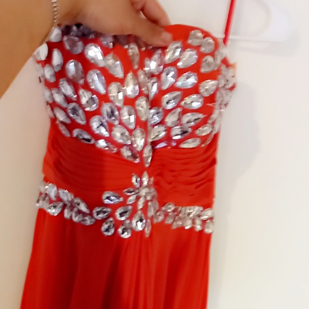 Orange strapless prom gown